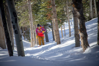 Skinning up a hill in Red Elephant Cagoule