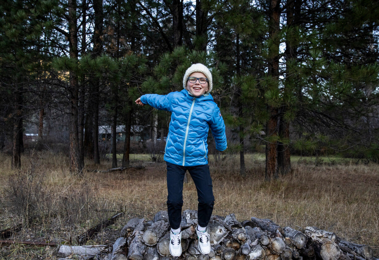 Jumping for joy in the Ice House Jacket