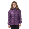 Woman wearing a purple quilted jacket on a white background