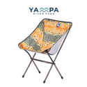 Foldable chair with colorful design on a white background, featuring the Yampa River Fund logo.