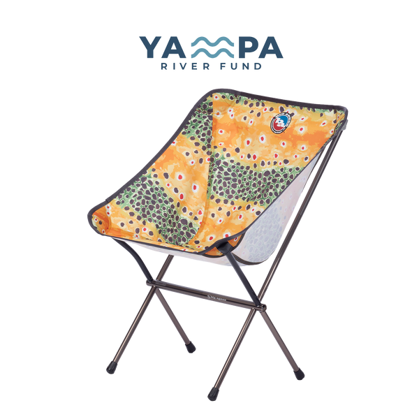 Foldable chair with colorful design on a white background, featuring the Yampa River Fund logo.