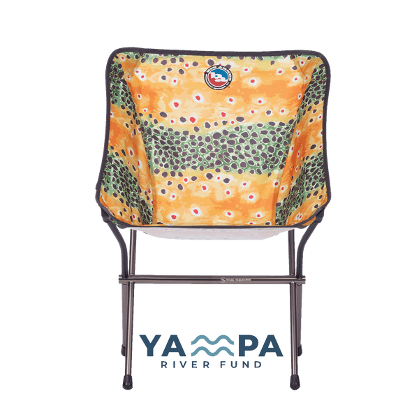 Folding chair with a colorful pattern on a white background, featuring the Yampa River Fund logo.