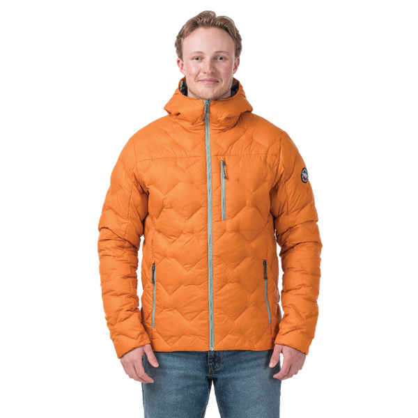 Man wearing an orange quilted jacket on a white background