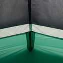Close-up of the inside corner of the Big Agnes String Ridge VST 1.5 tent, showing intersecting seams and mesh netting. The green geometric fabric highlights this ultralight shelter’s innovative design.