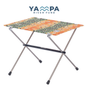 Portable folding table with colorful pattern on a white background, featuring the Yampa River Fund logo.
