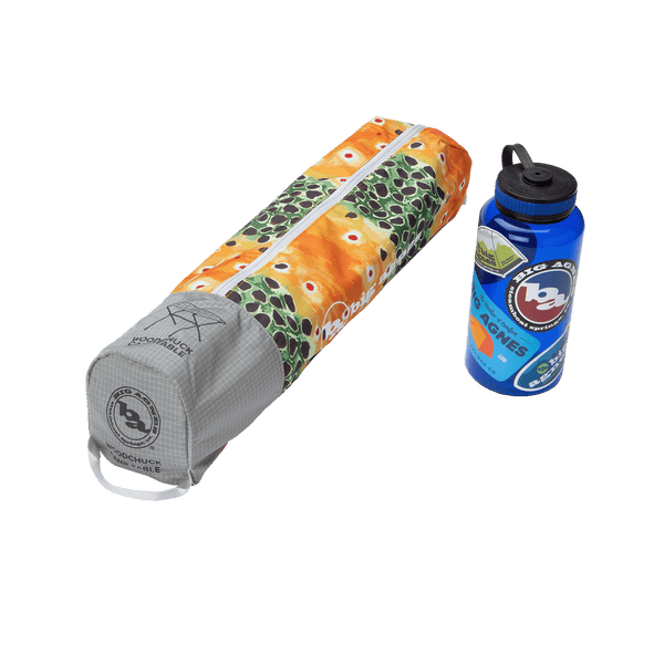 Yoga mat and water bottle with visible branding on a white background