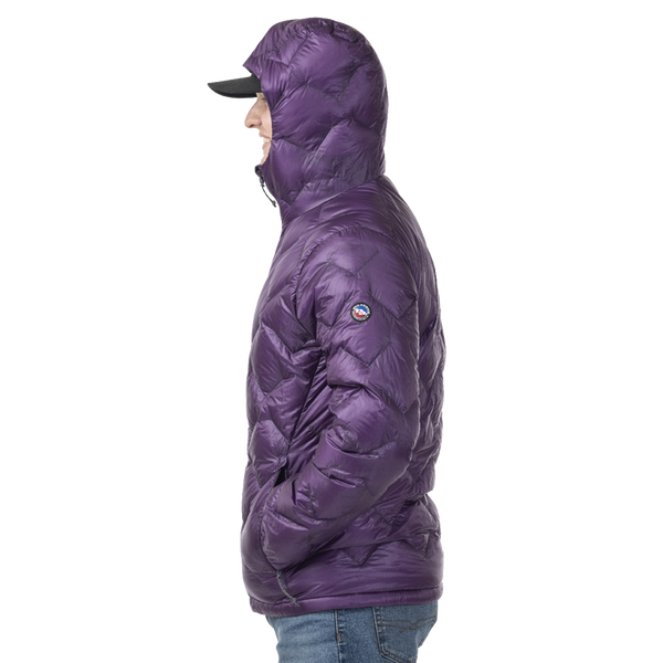 Person wearing a purple puffer jacket on a white background