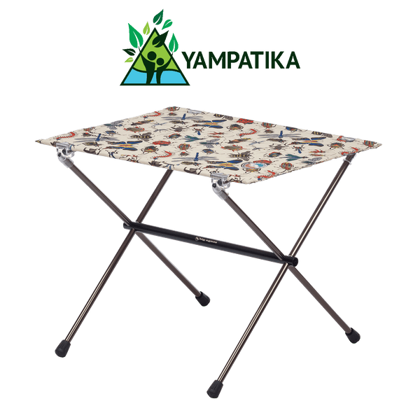 Portable folding table with colorful design on a white background, featuring Yampatika brand logo.