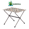 Portable folding table with colorful design on a white background, featuring Yampatika brand logo.